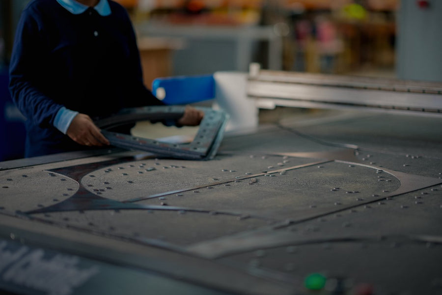 Cut gasket lifted from the cutting table